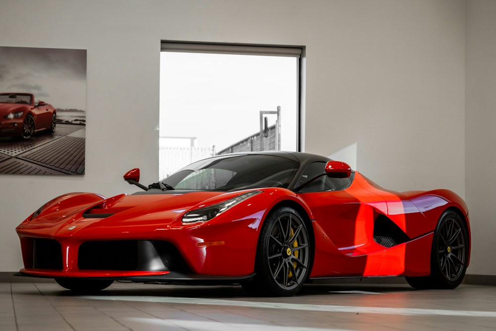 Red Ferrari with gleaming paintwork